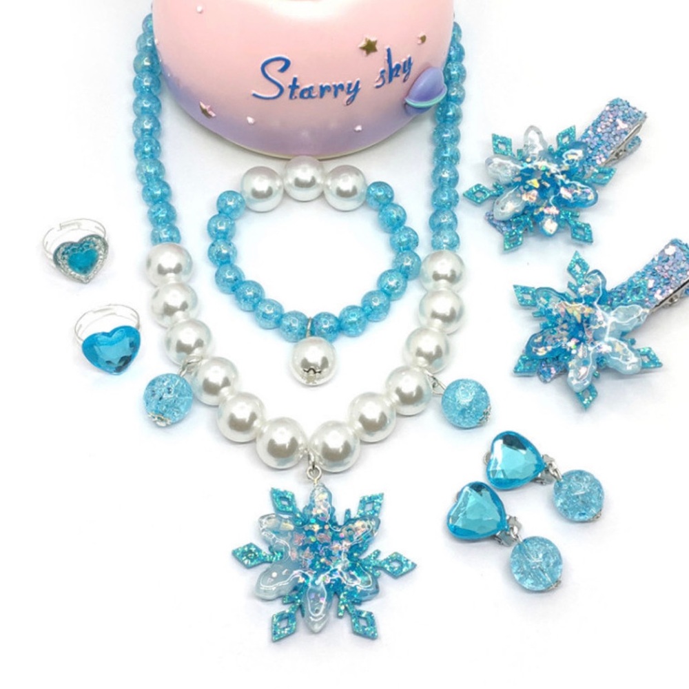 Blue and White Jewelry Set with Snowflake Design